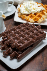Tasty Belgian dessert, Brussels waffles with chocolade and whipped cream
