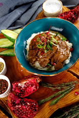 beef cheeks stewed in sauce with mashed potatoes