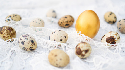 Fototapeta premium Golden self painted Easter egg. Happy Easter eggs. Festive background.