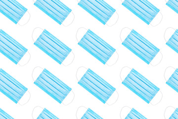 many medical face masks of blue color. protection against viruses and dust. located diagonally....