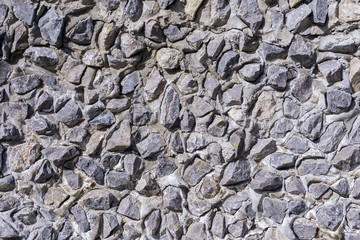 stone that are mixed with cement became stone concrete wall texture and background for web design and architect