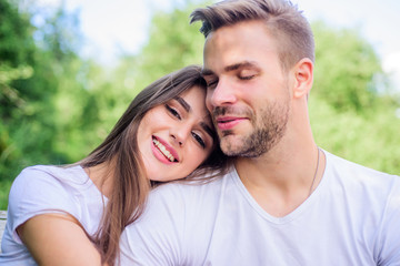 Obraz premium Being in love. happy valentines day. summer vibes. family weekend. romantic date. couple relax outdoor. Tender feeling. couple in love. Skin and hair care. girl with guy in park. Beauty and fashion