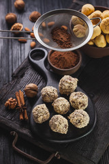 Delicious homemade chocolate chip cookies balls on a black wooden background. making confectionery sweets