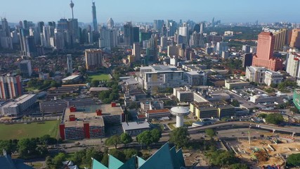 February 23rd, 2020 - Kuala Lumpur, Malaysia : 4k Establishing b-roll aerial shot of drone panning view of Kuala Lumpur General Hospital with Kuala Lumpur City Skyline