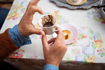 The turkish coffee in the hand fortune telling, divination, and tragedy for year of 2020.