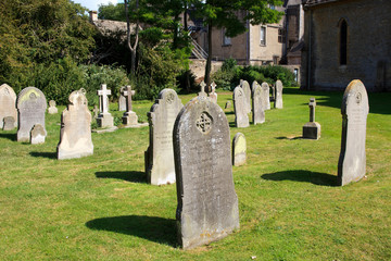 Bibury (England), UK - August 05, 2015: The cemetery in Bibury village, Gloucestershire, England, United Kingdom.