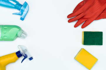 flat-lay Cleaning supplies on white background. Detergents for disinfecting. copy space 