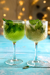 A glass of lemon soda with fresh mint