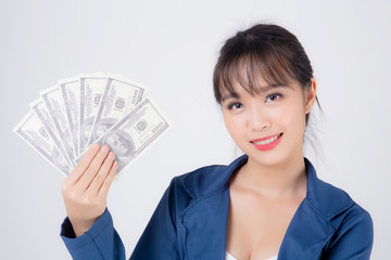 Beautiful portrait young business asian woman holding money isolated on white background, businesswoman showing banknotes with excited, happy girl income with profit finance and success concept.