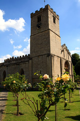 Fototapeta na wymiar Bibury (England), UK - August 05, 2015: The church in Bibury village, Gloucestershire, England, United Kingdom.