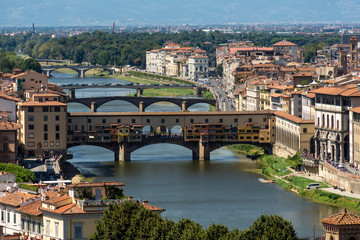 Fototapeta na wymiar View of Florence Vecchio Bridge and Arno river from Piazzale de Michelangelo during day