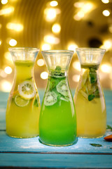 A glass of lemon soda with fresh mint