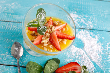 delicious Panna cotta on a blue background
