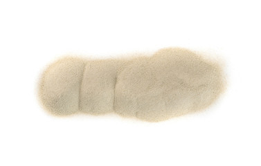 Sandy beach textured pile isolated on white background