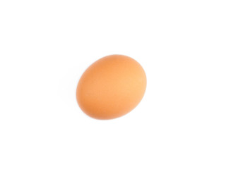 Brown egg on a white background. Healthy eating concept