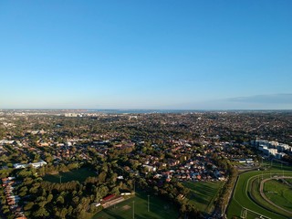 Obraz premium Drone panoramic aerial view of Sydney NSW Australia city Skyline and looking down on all suburbs 