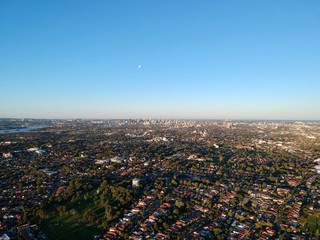 Drone panoramic aerial view of Sydney NSW Australia city Skyline and looking down on all suburbs 