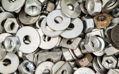 bolts and washers on the corner. building materials . metal products.