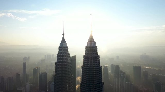Kuala Lumpur, Malaysia Twin Tower, Aerial view Sunrise soft light with Low Fog.
