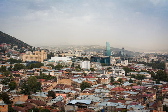 Beautiful landscape view of Old Town Tbilisi and modern glass tower Tbilisi, Georgia