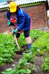 woman works in the garden