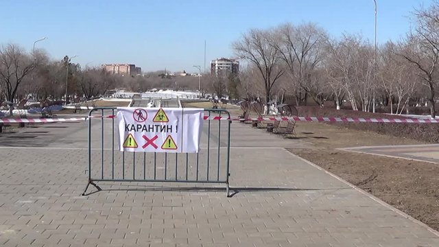 Karaganda, Kazakhstan - 3nd April, 2020 -The streets of the city are quarantined closed due to COVID-19 or Coronavirus outbreak lockdown. Information warning sign about quarantine measures in public p