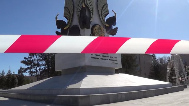 Karaganda, Kazakhstan - 3nd April, 2020 -The streets of the city are quarantined closed due to COVID-19 or Coronavirus outbreak lockdown. Information warning sign about quarantine measures in public p