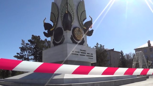 Karaganda, Kazakhstan - 3nd April, 2020 -The streets of the city are quarantined closed due to COVID-19 or Coronavirus outbreak lockdown. Information warning sign about quarantine measures in public p