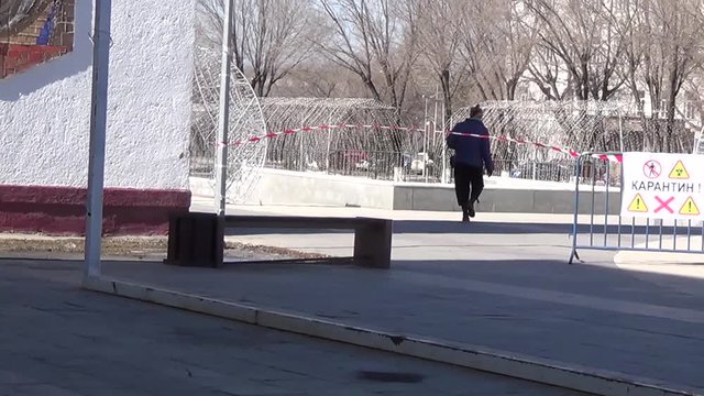 Karaganda, Kazakhstan - 3nd April, 2020 -The streets of the city are quarantined closed due to COVID-19 or Coronavirus outbreak lockdown. Information warning sign about quarantine measures in public p