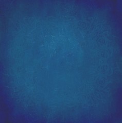 Abstract grunge gradient textured blue background.