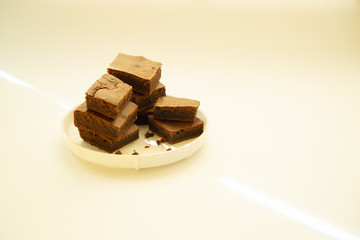Chocolate brownie bits with place for text.