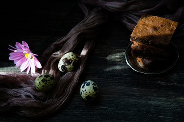 Chocolate brownie on quail eggs