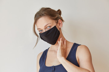 Girl in black medical mask