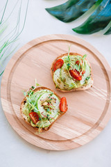 Tasty italian bruschetta on the wooden plate