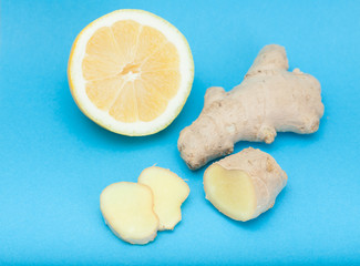 Lemon with ginger slices and selective focus