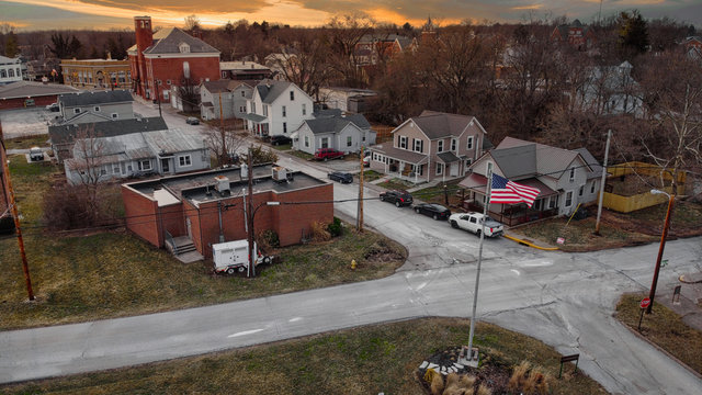 Arieal photo of small town at sunset. Could be any town in America. Downtown small village during golden hour. Beautiful scenic drone photo