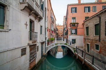 Fototapeta na wymiar Venice, Italy - 25 October, 2017: narrow old streets and famous gondola on Grand Canal.