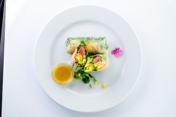 vegetable spring rolls decorated with flowers
