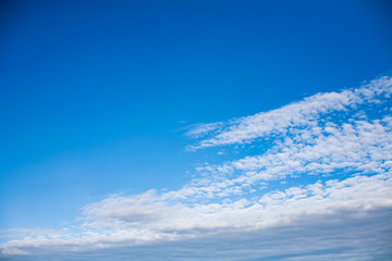 Naklejka na ściany i meble Beautiful blue sky with white clouds.