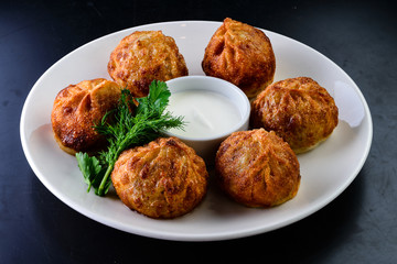 large fried manti dumplings