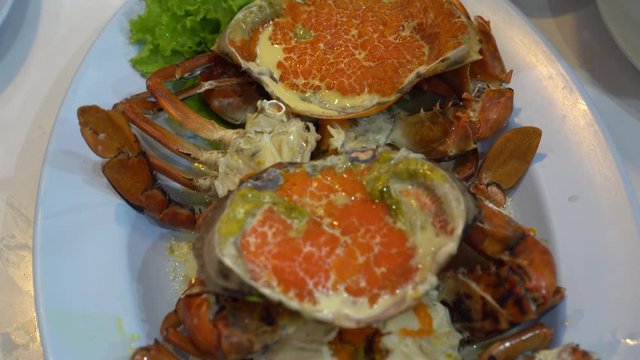 Thai seafood delicacy steamed crab egg with milk eating with sauce dip