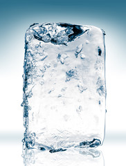 Frozen block of textured clear blue ice. Clipping path included.