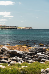 View of the ocean and cliffs of Mistral Point, Maroubra, as seen from the start of the Malabar Headland National Park Coastal Walk.