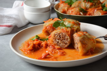 Cabbage rolls stuffed with ground beef and rice in tomato sauce