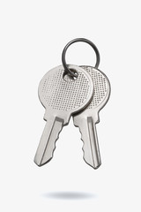 A pair of keys isolated on white background. Full depth of field. Cut with the pen tool.