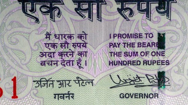 Hundred Indian Rupee INR or 100 Rupee Cash macro view and Stop Motion. Concept Business Concept. Stop Motion