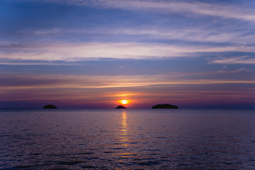 Beautiful sunset at the beach in the tropics. Sky and ocean