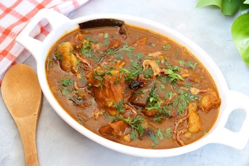 Mutton Kadai or Bhuna Gosht or Spicy Mutton curry is a famous Spicy nonvegetarian dish of India. Its made out of Lamb or Goat meat along with spices. Garnished with fresh coriander and fried onions. 