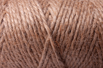 Natural jute twine as background. Macro view of linen thread. Texture of fiber pattern