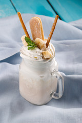 milkshakes with cookies, ice cream, and whipped cream.